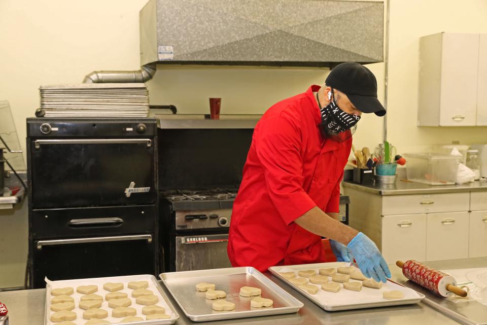 Alan Goodman of A Goodman’s Desserts, preps cookies for baking. He was the most recent winner of the Rev-Up MKE business competition that's returned to Milwaukee's near west side this year.