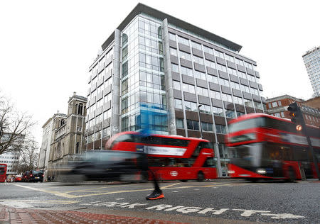 People walk past the building housing the offices of Cambridge Analytica in central London, Britain, March 20, 2018. REUTERS/Henry Nicholls