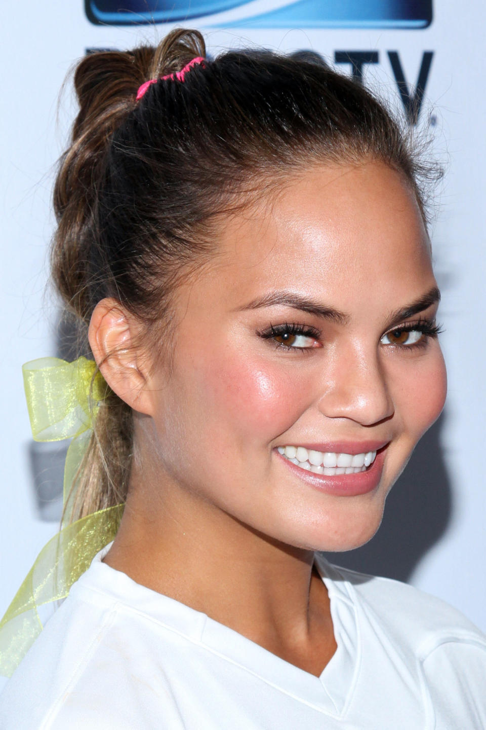 NEW YORK, NY - FEBRUARY 01:  Model Chrissy Teigen attends the DirecTV Beach Bowl at Pier 40 on February 1, 2014 in New York City.  (Photo by Rob Kim/Getty Images for DirecTV)