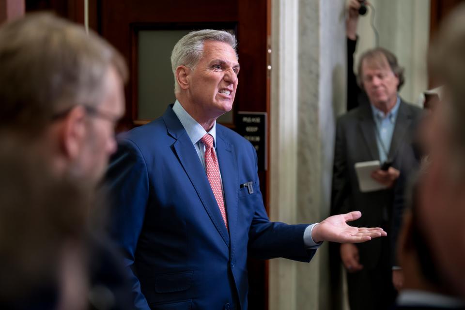 Speaker of the House Kevin McCarthy, R-Calif., talks to reporters outside his office about calls for an impeachment inquiry of President Joe Biden, at the Capitol in Washington, Tuesday, July 25, 2023. (AP Photo/J. Scott Applewhite) ORG XMIT: DCSA129
