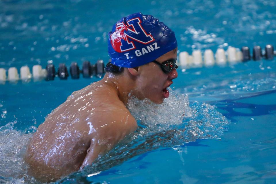 Natick’s Tyler Ganz competes in the 200-yard Medley Relay during the swim meet against Framingham at Keefe Tech in Framingham on Jan. 21, 2022.