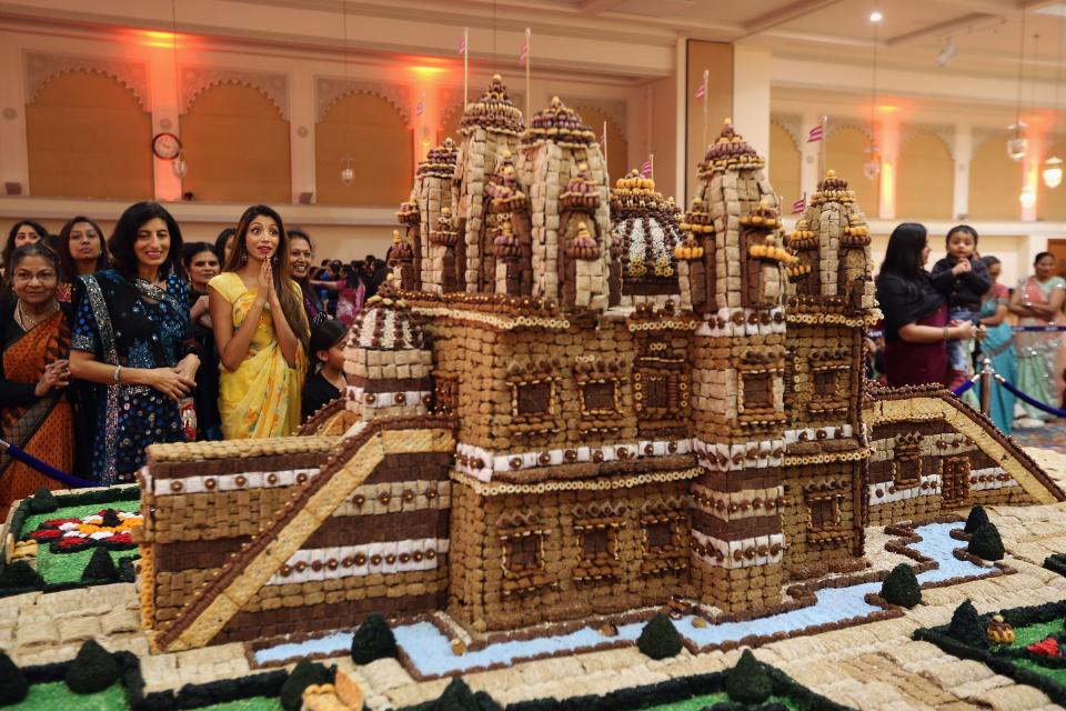 LONDON, ENGLAND - NOVEMBER 14: A temple made from food is presented as Sadhus and Hindus celebrate Diwali at the BAPS Shri Swaminarayan Mandir on November 14, 2011 in London, England. Diwali, which marks the start of the Hindu New Year, is being celebrated by thousands of Hindu men women and children in the Neasden mandir, which was the first traditional Hindu temple to open in Europe. (Photo by Dan Kitwood/Getty Images)