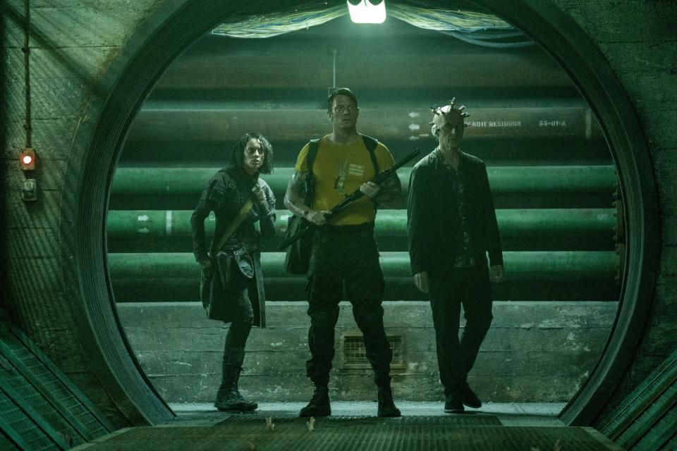 Daniela Melchior, Joel Kinnaman, and Peter Capaldi play Ratcatcher 2, Rick Flag, and Thinker in "The Suicide Squad."