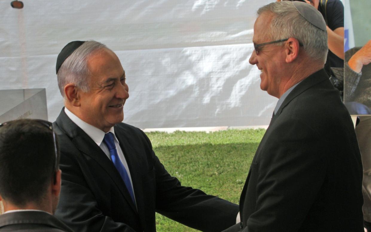 Benjamin Netanyahu (left) and Benny Gantz (right) met for the first time since the election - AFP