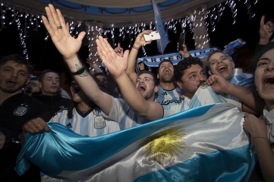 Argentina’s supporters celebrate victory at the Plaza del Castillo in downtown Pamplona, Navarre region, northern Spain (EPA)