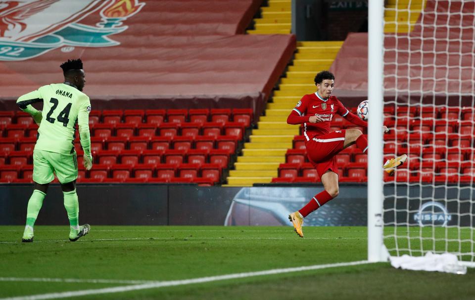 Andre Onana finds himself stranded as Curtis Jones scoresGetty Images