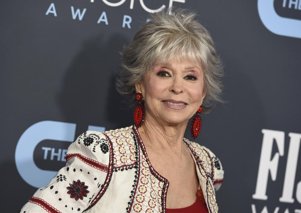 FILE - Rita Moreno arrives at the 25th annual Critics' Choice Awards on Jan. 12, 2020 in Santa Monica, Calif. Moreno, an EGOT (Emmy, Grammy, Oscar, Tony) winner whose career spans over seven decades says she has seen huge progress for women and other minorities in Hollywood but is still “mightily and profoundly” concerned about why Hispanics haven’t gotten a hold on their profession. (Photo by Jordan Strauss/Invision/AP, File)