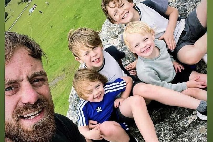 Plymouth dad Steven Barnes pictured with his children