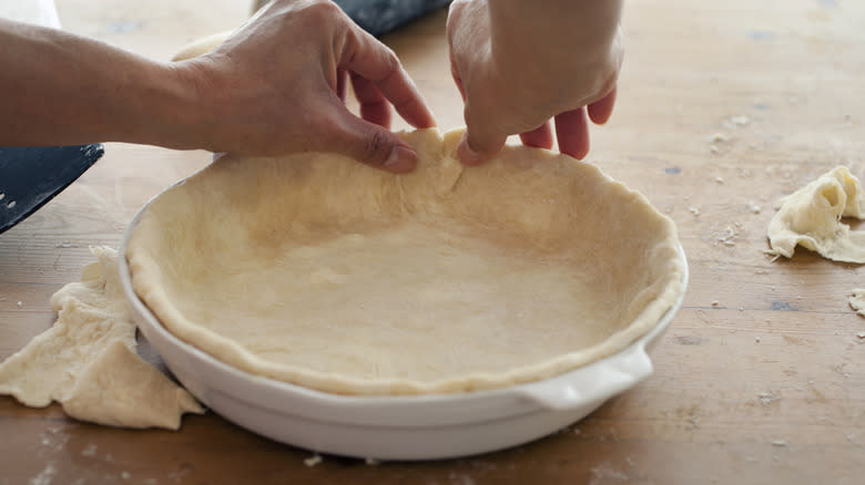 Person making a pie