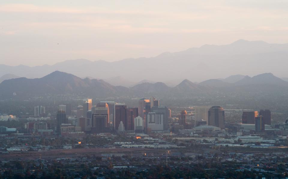 View of the downtown Phoenix, Arizona city skyline as seen from South Mountain Park, August 28, 2018. (Photo by Robyn Beck / AFP)