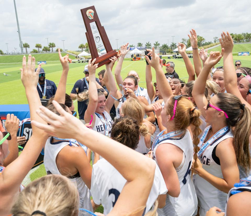 American Heritage players celebrate winning the Class 1A state championship over Lake Highland Prep during their game in Naples on Saturday, May 11, 2024. Photo by Darron R, Silva/Special to USA Today Network-Florida