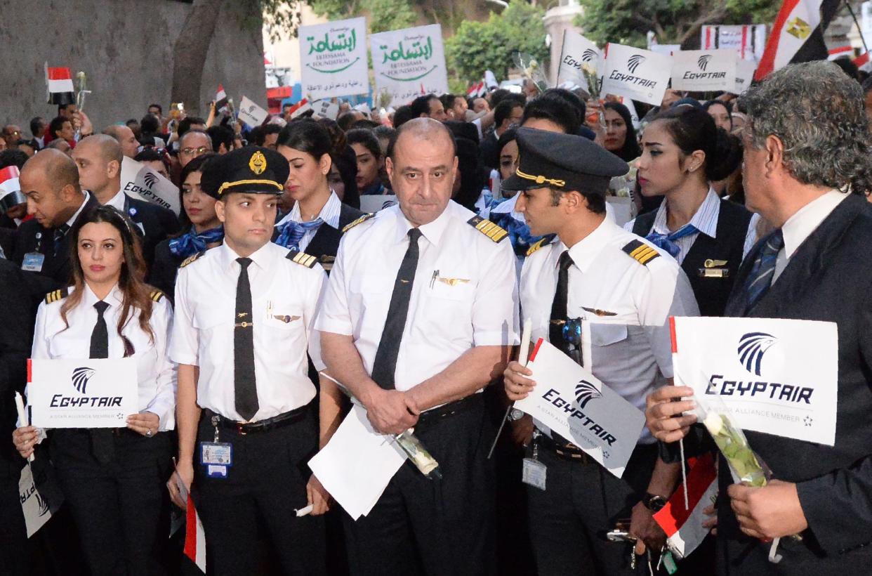 Pilots march in honor of the 66 victims of Egyptair 804 in 2016.