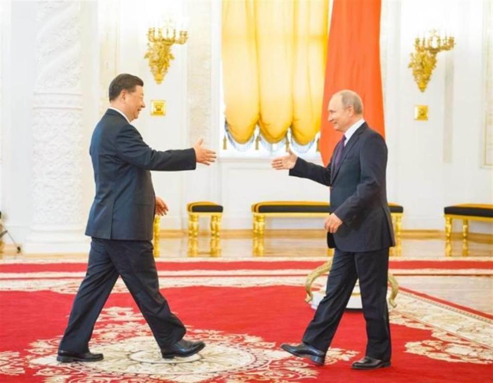 俄羅斯總統普丁與中國領導人習近平。   圖：翻攝新華網（資料照）