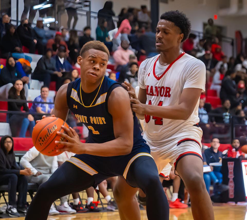 Stony Point forward Josiah Moseley, left, is the American-Statesman's 2024 Central Texas boys basketball player of the year, repeating his 2023 honor. He led the Tigers to the Class 6A state championship game and will play in college at Villanova.