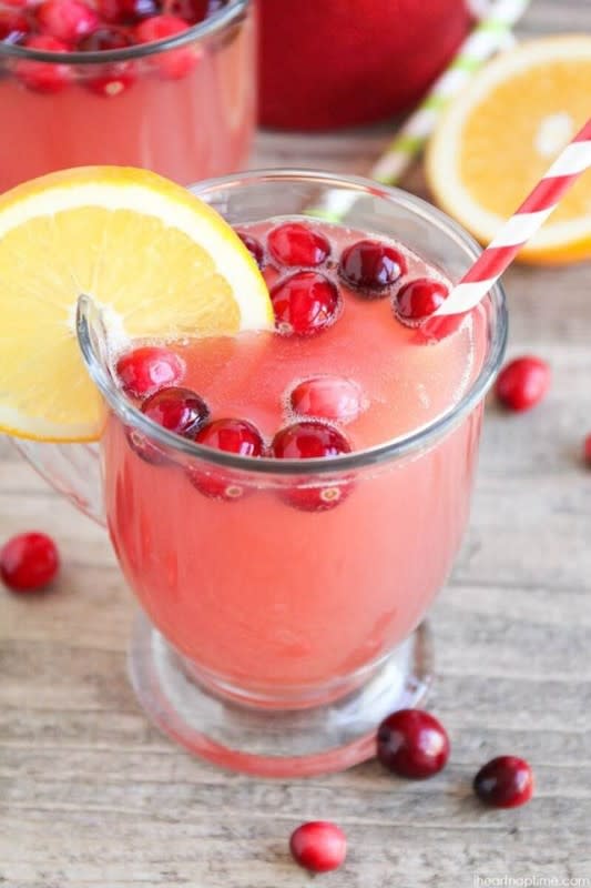 <p>I Heart Naptime</p><p>Made with pineapple, cranberry and orange juice, this simple-to-make punch is such a delicious combination!</p><p><strong>Get the recipe: </strong><a href="https://www.iheartnaptime.net/holiday-punch-recipe/" rel="nofollow noopener" target="_blank" data-ylk="slk:Holiday Punch;elm:context_link;itc:0;sec:content-canvas" class="link "><strong>Holiday Punch</strong></a></p>