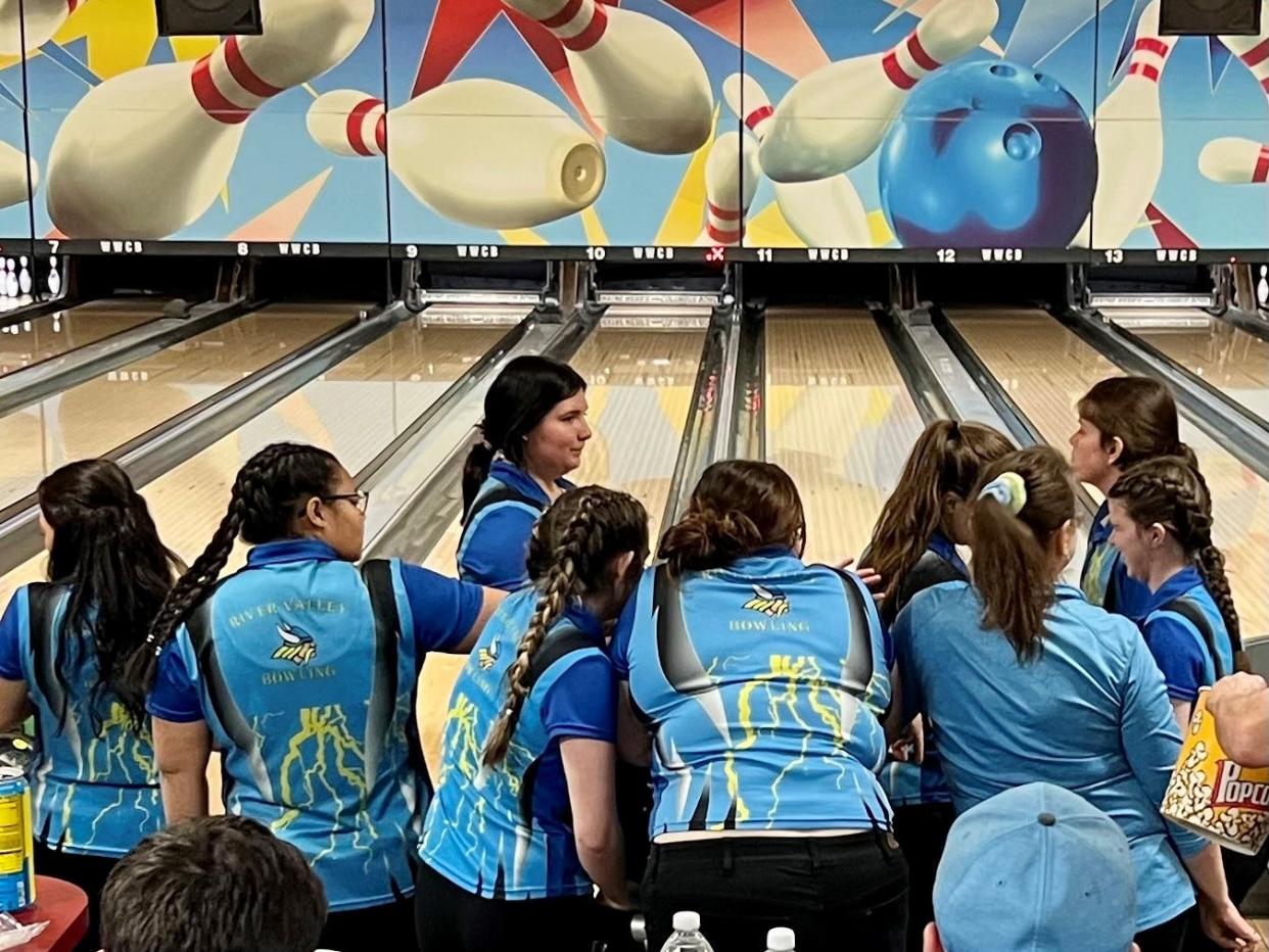 River Valley gathers together during the Division II girls bowling state championships Friday at Wayne Webb's Columbus Bowl.