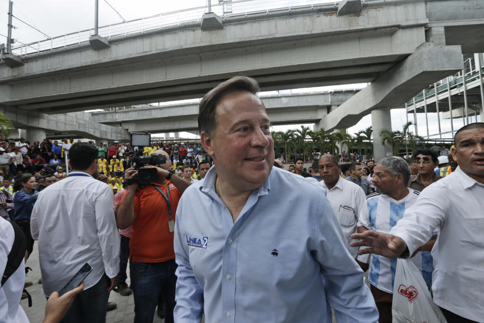 In this April 25, 2019 photo, Panama's President Juan Carlos Varela attends the opening ceremony of the Metro Line 2, in Panama City. Anger over brazen corruption and weariness over the political status quo are widespread among the Panamanian electorate ahead of the May 5th vote to pick a successor to Varela. (AP Photo/Arnulfo Franco)