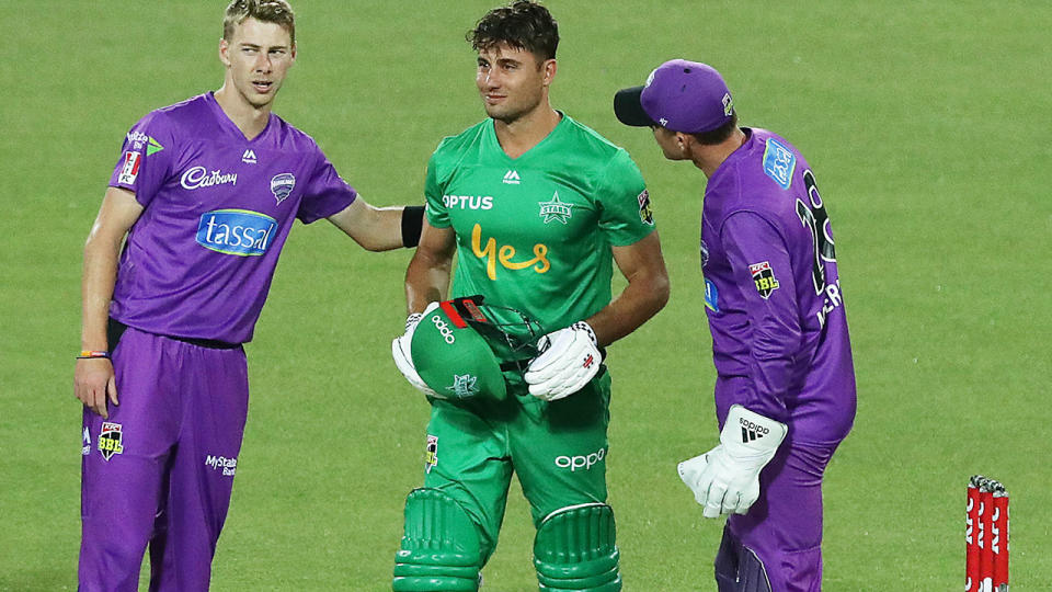 Riley Meredith, pictured here checking on Marcus Stoinis after the scary moment.