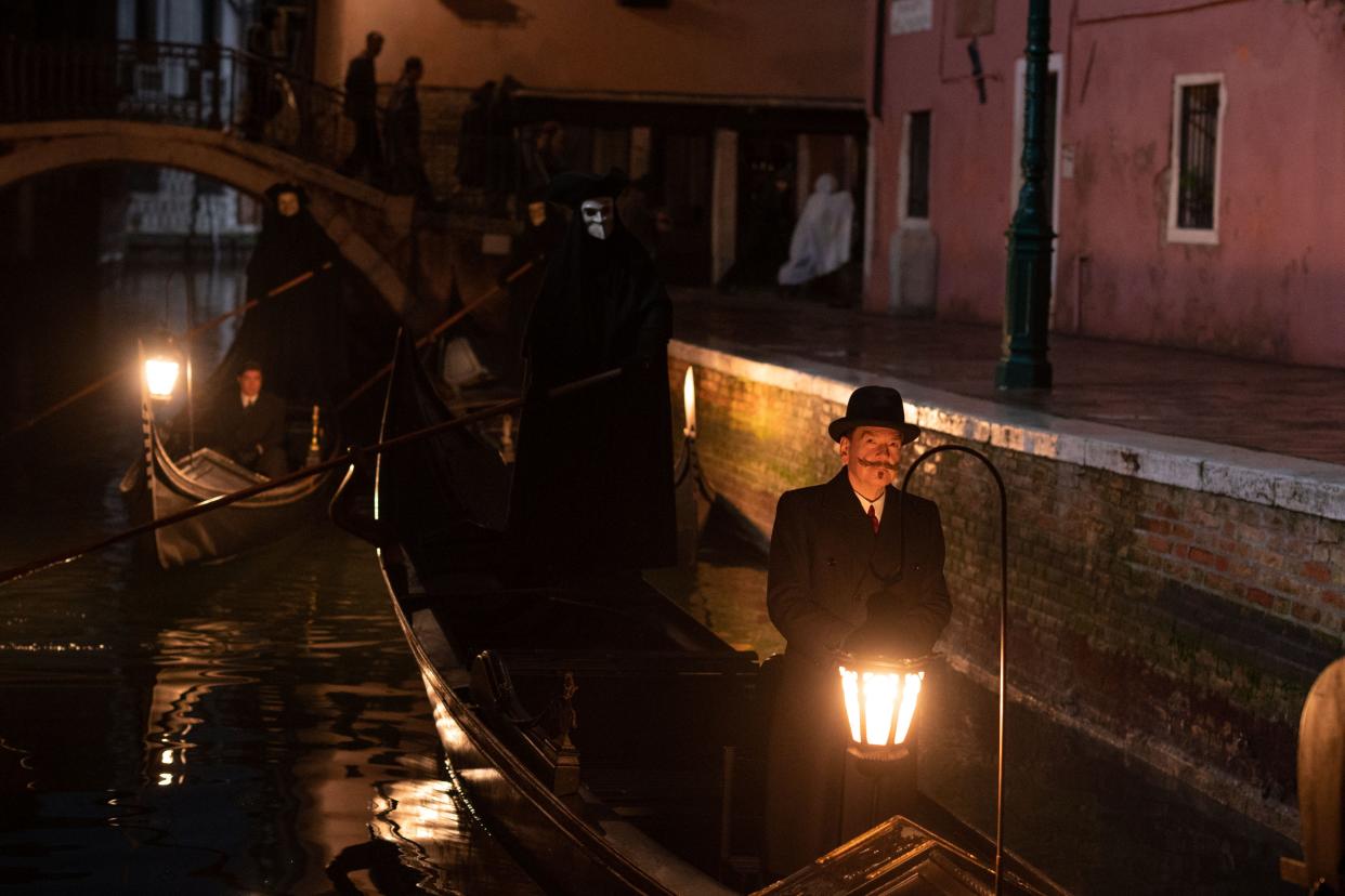 Riccardo Scamarcio plays Vitale Portfoglio and Kenneth Branagh is Hercule Poirot in "A Haunting in Venice."