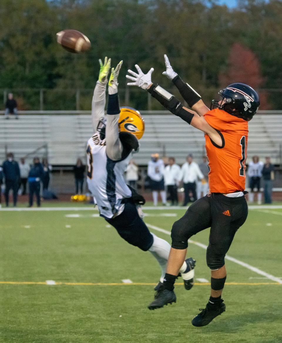 Marine City’s Parker Atkinson catches a pass for a long gain in the first quarter of the Mariners' 47-8 win over Clinton Township Clintondale at East China Stadium on Friday.