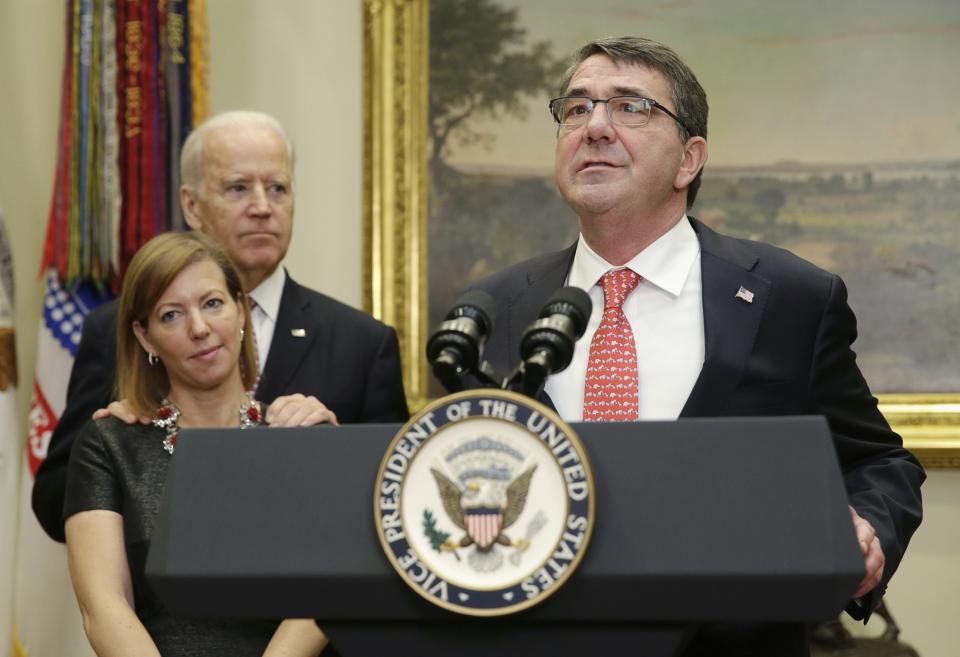 New U.S. Secretary of Defense Ash Carter delivers his acceptance speech at the White House as Vice President Joe Biden and Carter's wife, Stephanie Carter, look on, Feb. 17, 2015. (Photo: Gary Cameron/Reuters/File)