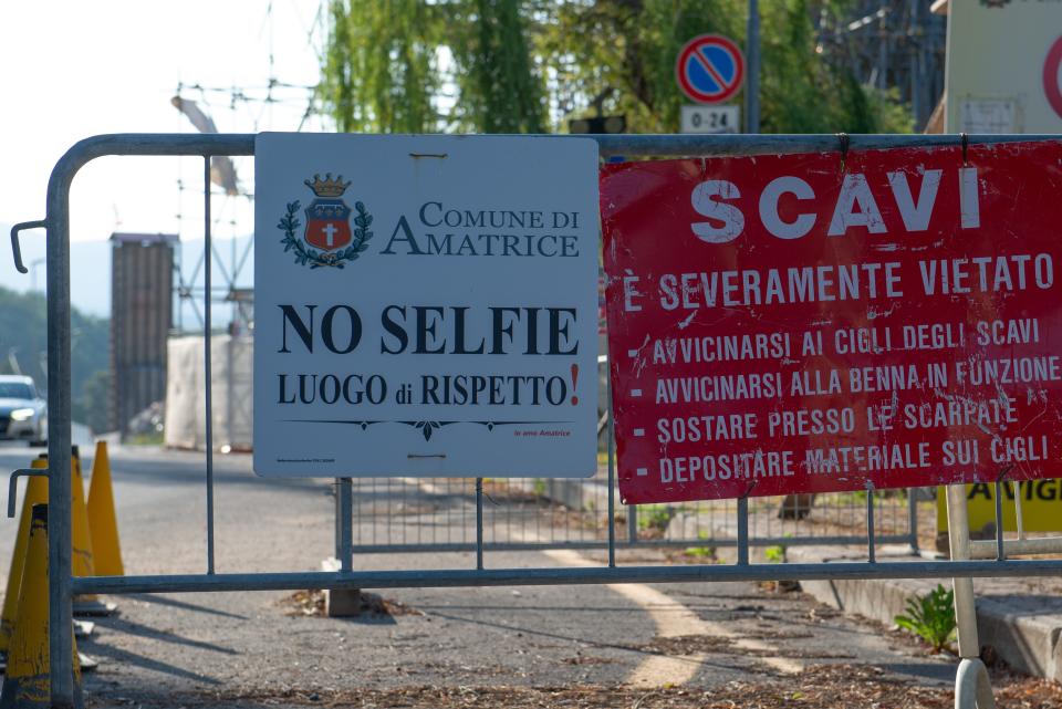 Road and respect signs (No selfie) at the entrance in red zone in Amatrice Italy