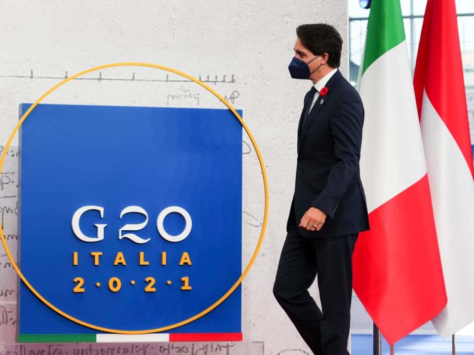 Prime Minister Justin Trudeau arrives at the G20 summit in Rome on Saturday. He issued a statement on Sunday about climate change, saying that 'we need to tackle this global crisis with urgency and ambition.' (Sean Kilpatrick/The Canadian Press - image credit)