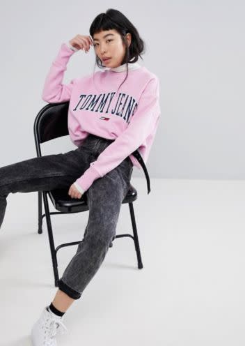 Those iconically '90s branded sweatshirts, hoodies and t-shirts you grew up wearing? They're back and better than ever, especially because brand iconography will be huge in 2018.&nbsp;<br /><br />Pictured: <a href="http://us.asos.com/tommy-jeans/tommy-jeans-collegiate-sweatshirt/prd/9112166" target="_blank">Tommy Jeans Collegiate Sweatshirt from ASOS</a>