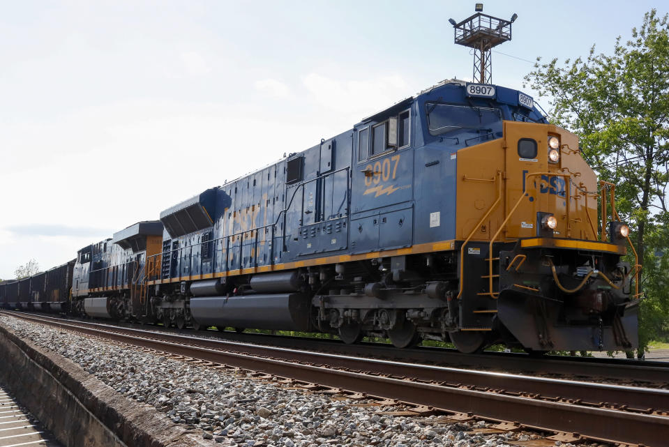 FILE - A CSX freight train pulls through McKeesport, Pa., on June 2, 2020. A federal judge has ruled that the details of conversations between the nation’s four largest railroads should be included in lawsuits challenging billions of dollars of charges the railroads imposed in the past. (AP Photo/Gene J. Puskar, File)