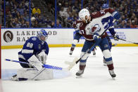 Tampa Bay Lightning goaltender Andrei Vasilevskiy (88) stops a shot by Colorado Avalanche left wing J.T. Compher (37) during the second period of Game 6 of the NHL hockey Stanley Cup Finals on Sunday, June 26, 2022, in Tampa, Fla. (AP Photo/Phelan Ebenhack)