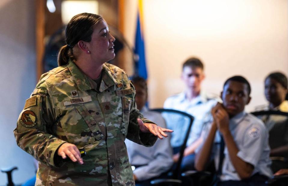 U.S. Air Force Maj. Angelina Urbina, 375th Force Support Squadron commander, speaks to a Cadet Advanced Leadership Course group during their graduation on Scott Air Force Base. The course was designed to build, foster and advance the leadership skills of rising high school juniors and seniors to prepare them for their increased responsibility in JROTC the following school year.