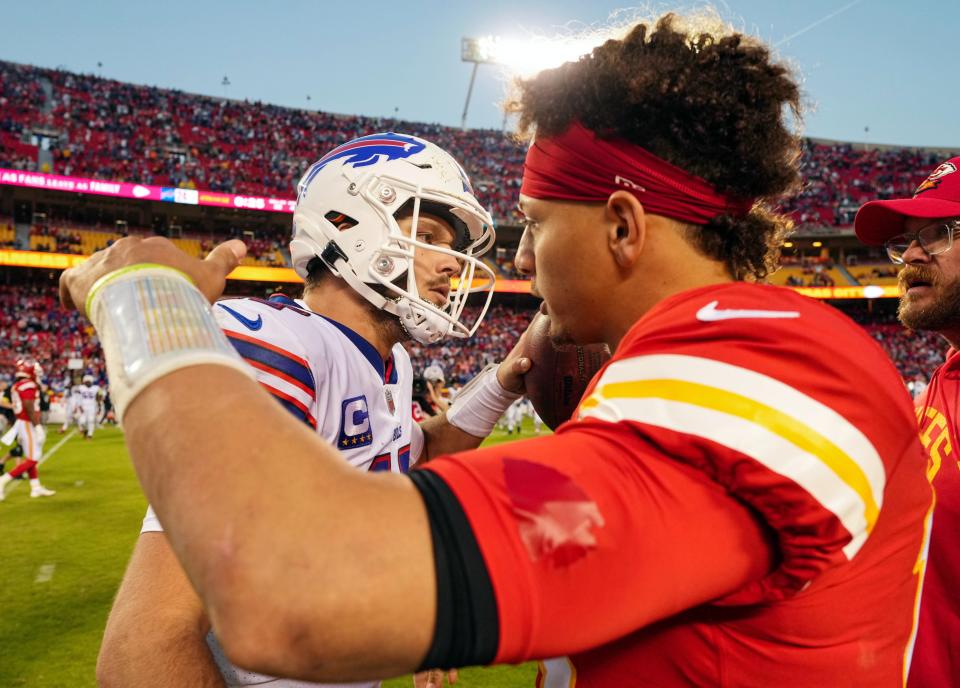 Josh Allen hugs Patrick Mahomes after a game at Arrowhead Stadium on Oct. 16, 2022.