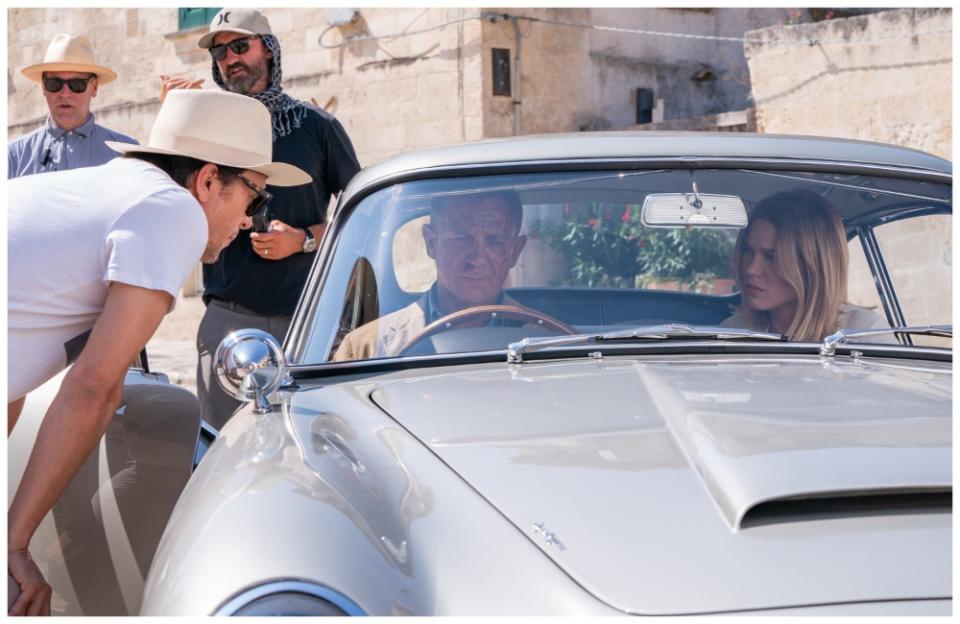 Cary Joji Fukunaga, Daniel Craig and Léa Seydoux on the set of “No Time to Die”