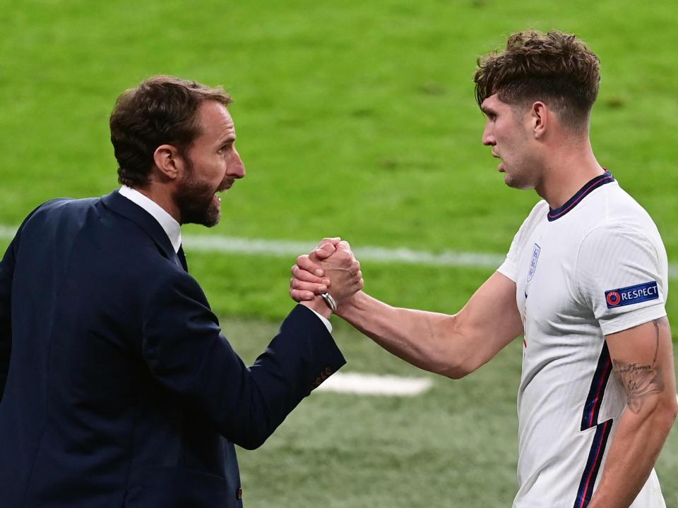 Gareth Southgate congratulates John Stones after victory over the Czech Republic (POOL/AFP/Getty)