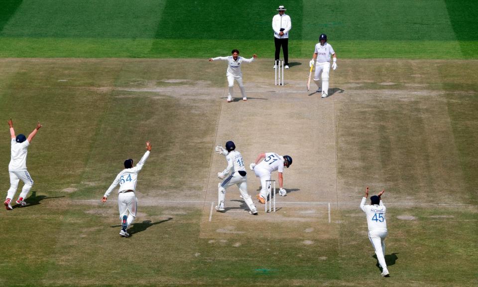 <span>India's Kuldeep Yadav celebrates taking the wicket of England's Jonny Bairstow during the tourists’ latest middle order collapse.</span><span>Photograph: Adnan Abidi/Reuters</span>