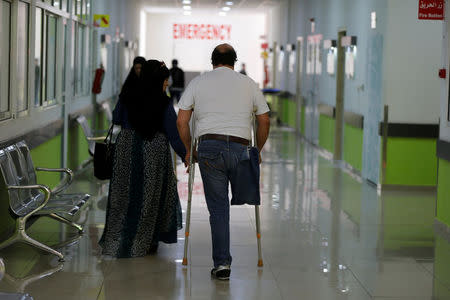 A man, who was wounded in Syria, walks inside a hospital in Tripoli, Lebanon May 24, 2017. Picture taken May 24, 2017.REUTERS/Mohamed Azakir