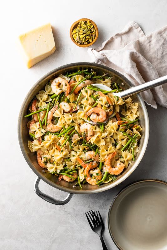 <p>Nourish and Fete</p><p>A bright dish of lemon asparagus pasta perked up with shrimp and crunchy pistachios. Ready in less than 30 minutes, this meal is perfect for adding some variety to busy weeknight comfort food!</p><p><strong>Get the Recipe: </strong><a href="https://www.nourish-and-fete.com/lemon-asparagus-pasta/" rel="nofollow noopener" target="_blank" data-ylk="slk:Lemon Asparagus Shrimp Pasta;elm:context_link;itc:0;sec:content-canvas" class="link "><strong>Lemon Asparagus Shrimp Pasta</strong></a></p><p><strong>Related: <a href="https://parade.com/1325505/parade/shrimp-recipes/" rel="nofollow noopener" target="_blank" data-ylk="slk:100+ Best Shrimp Recipes For Easy Dinner Ideas;elm:context_link;itc:0;sec:content-canvas" class="link ">100+ Best Shrimp Recipes For Easy Dinner Ideas</a></strong></p>