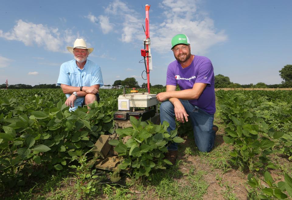 Greenfield Robotics is a company that builds robots that control weeds by cutting them down without tillage and without herbicides, owned by Kansas farmer and CEO Clint Brauer, right, with Jerry Poole, company president and COO.