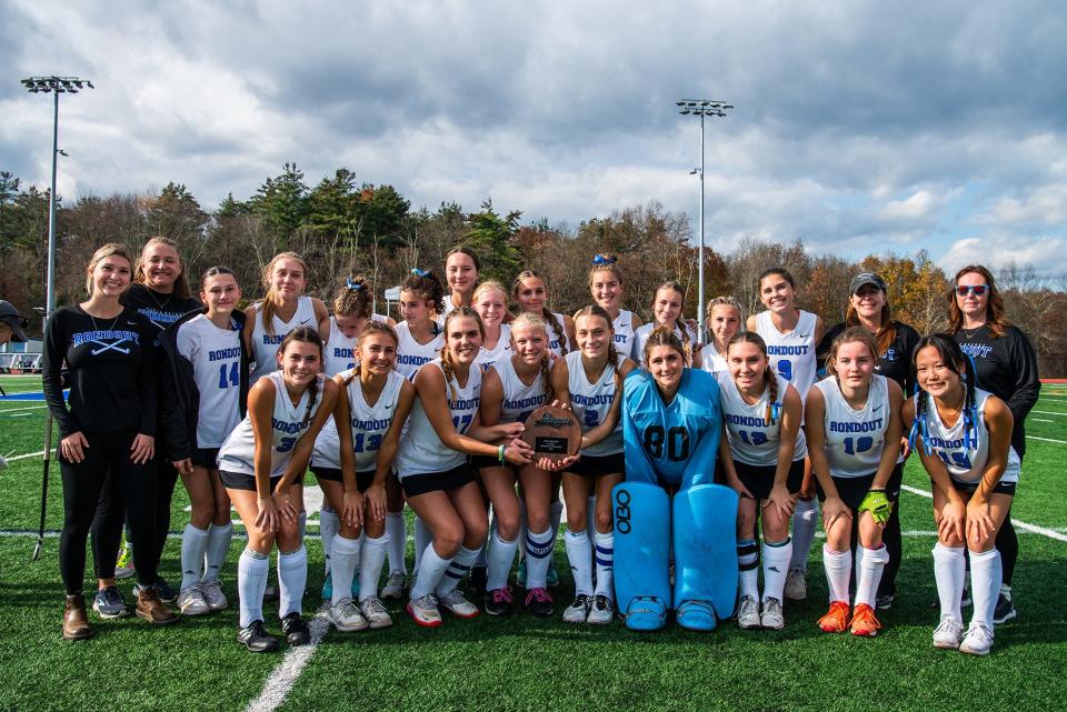 Rondout poses with the runnerup plaque during the girls Class C regional field hockey game in Accord, NY on Sunday, November 5, 2023. Rondout lost to Hoosick Falls in overtime 2-1. KELLY MARSH/FOR THE TIMES HERALD-RECORD