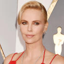 <p>Sultry dark shadows allow Theron's bright eyes to pop. "Her eyes enables for the possibility to go from very natural to super glamorous," says her makeup artist Francesca Tolot. For the Academy Awards in 2016, Tolot dusted a reddish toned eyeshadow "over the crease to compliment the blue of her eyes," she says.</p>