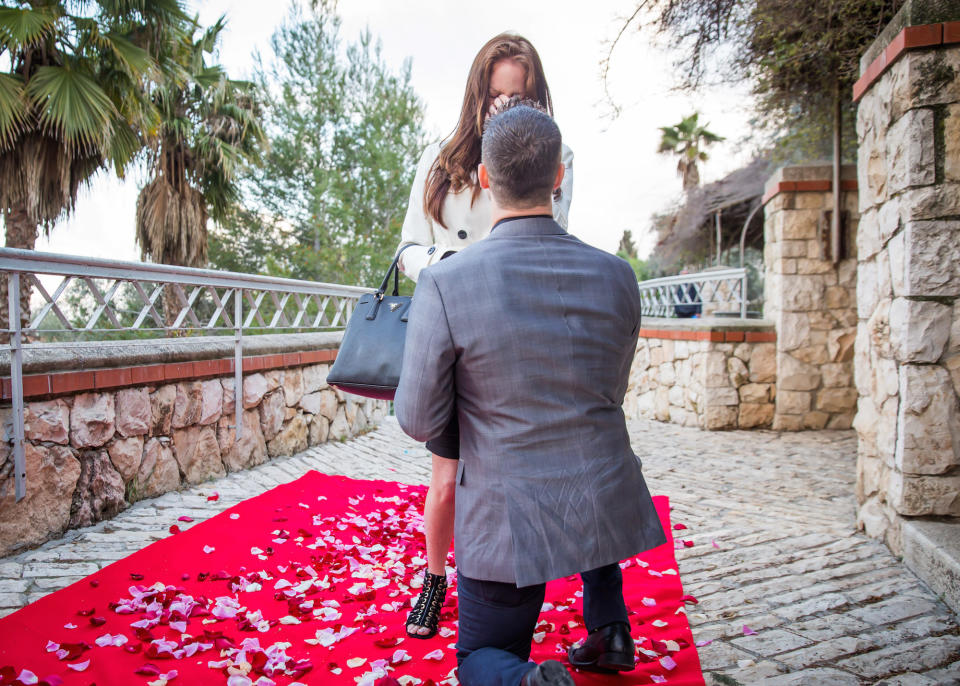 <p>A red rug scattered with petals adds an extra touch of romance to the historic Old City of Jerusalem, where stone streets and palms created the perfect backdrop for one couple's engagement.</p><p><em>Via <a rel="nofollow noopener" href="https://urldefense.proofpoint.com/v2/url?u=http-3A__www.herschelgutmanphotography.com_&d=DwMFAg&c=B73tqXN8Ec0ocRmZHMCntw&r=1SKxxQCjta-pWEjaI7W4C1a9YhNhSr750SSHCTkjllE&m=kZjinu6XP9O9VVXGiGjvo227RHVPjvUu522yzIapbeQ&s=lA1wKei_HVUj-hIWr6UoCuGcofoFDtW2iutZIMvi8d8&e=" target="_blank" data-ylk="slk:Herschel Gutman Photography;elm:context_link;itc:0;sec:content-canvas" class="link ">Herschel Gutman Photography</a> and <a rel="nofollow noopener" href="http://www.smashingtheglass.com/" target="_blank" data-ylk="slk:Smashing The Glass;elm:context_link;itc:0;sec:content-canvas" class="link ">Smashing The Glass</a></em><br></p>