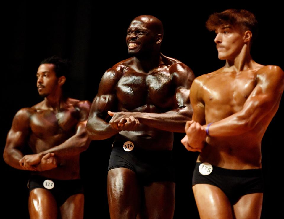 (Left to right) Tashan Bond, LaVar Washington and Parker Tracy strike poses during the NFF (Natural Fit Federation) Red River Classic Saturday afternoon, July 8, 2023, at Riverview Hall in downtown Shreveport. 