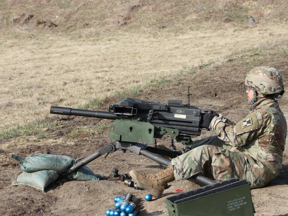 A soldier finishes firing the Mk 19 automatic grenade launcher, March 15, 2019, at Camp Atterbury, Ind.