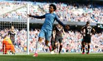 <p>Leroy Sane celebrates making it 1-0</p>