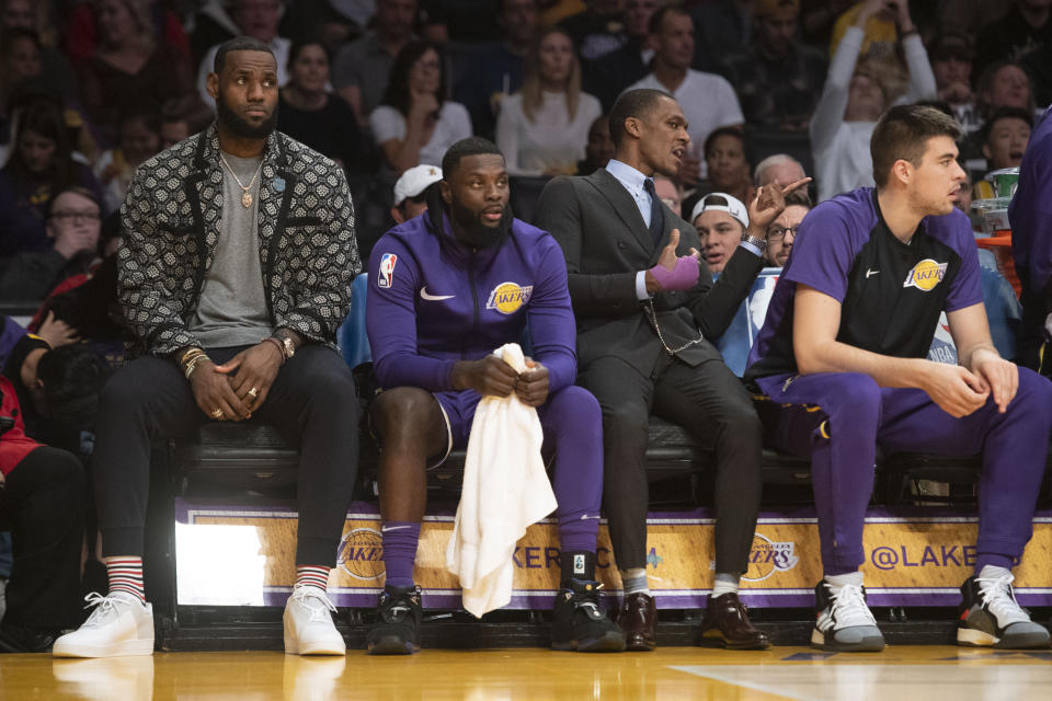 A groin injury has relegated LeBron James to a being a spectator for the last eight Lakers games. (Getty)