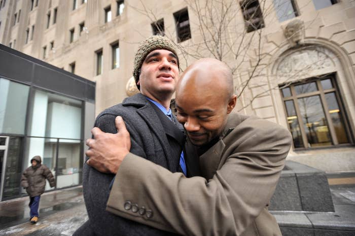 Vincent Thames (right) celebrates with Josh Tepfer of the Center on Wrongful Convictions at Northwestern University School of Law on Jan. 17, 2012, after a hearing for Thames and three other men, whose 1994 rape and murder convictions were overturned.