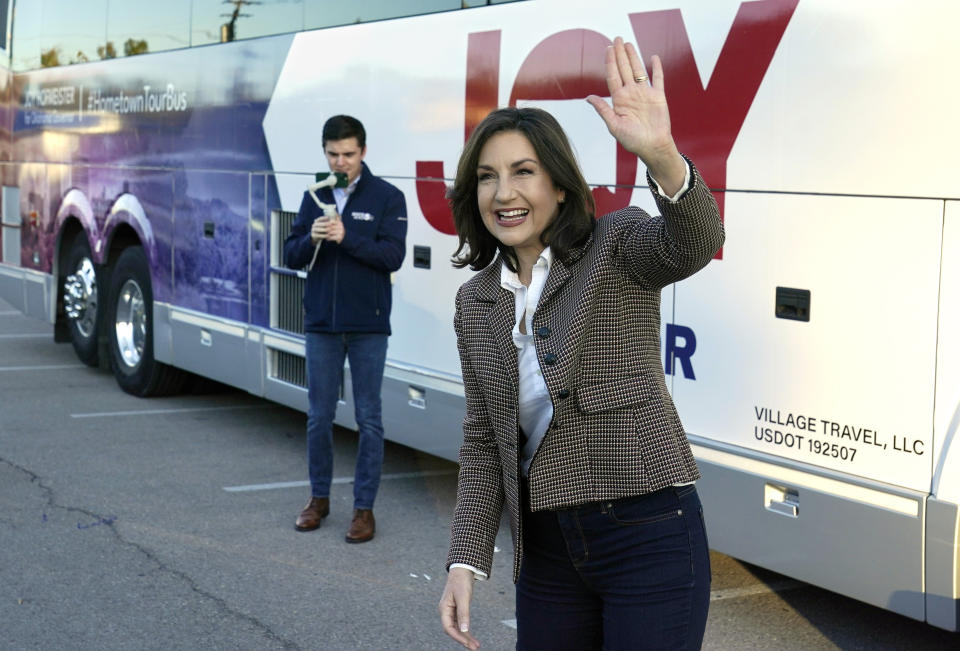 Joy Hofmeister, Democratic candidate for Oklahoma governor, waves to supporters as she arrives on her campaign tour bus, Tuesday, Nov. 1, 2022, in Oklahoma City. (AP Photo/Sue Ogrocki)