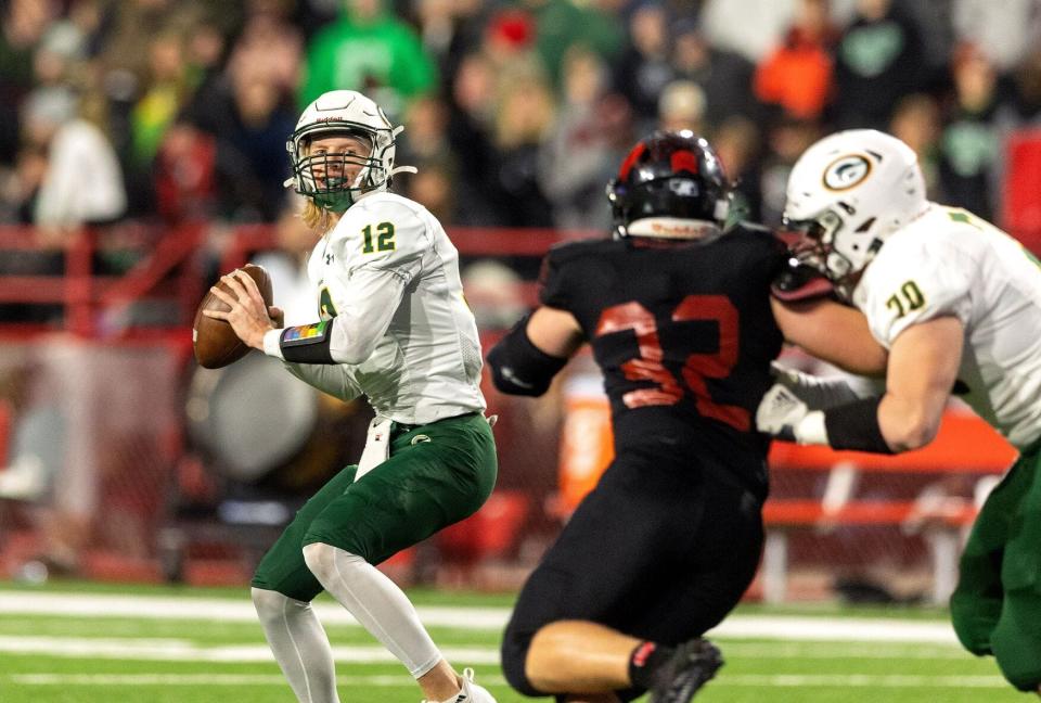 Gretna (Neb.) High School quarterback Zane Flores (12) is set to sign with Oklahoma State on Wednesday.