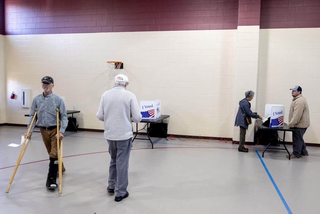 Residents vote at their voting precinct at New Bridge Academy in Cayce, S.C.