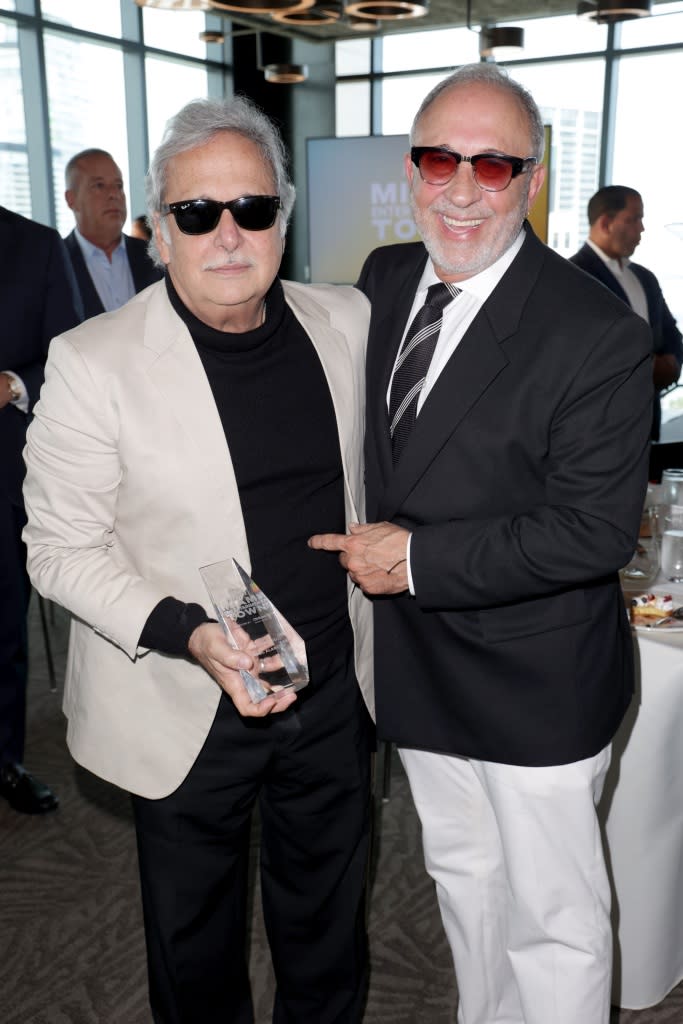 MIAMI, FLORIDA - APRIL 13: Raúl Alarcón and Emilio Estefan are seen during Variety's Miami Entertainment Town Brunch Presented By CN Bank on April 13, 2023 in Miami, Florida. (Photo by John Parra/Variety via Getty Images)